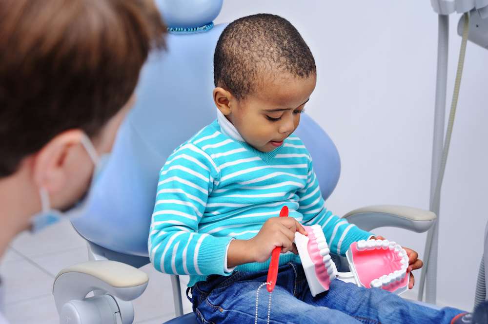 Young boy in the dental chair of a pediatric dentist